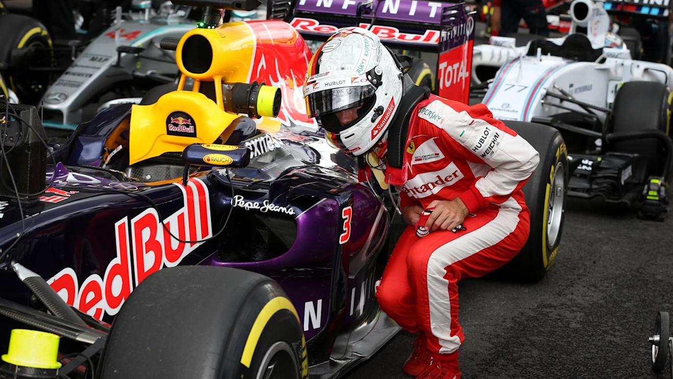 Sebastian Vettel (GER) Ferrari looks at the Red Bull Racing RB11 car at Formula One World Championship, Rd17, Mexican Grand Prix, Qualifying, Circuit Hermanos Rodriguez, Mexico City, Mexico, Saturday 31 October 2015. © Sutton Motorsport Images