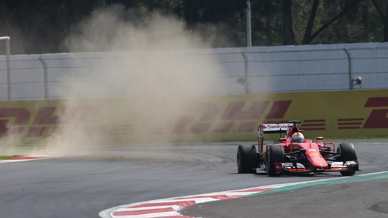Sebastian Vettel (GER) Ferrari SF15-T with a puncture on lap one at Formula One World Championship, Rd17, Mexican Grand Prix, Race, Circuit Hermanos Rodriguez, Mexico City, Mexico, Sunday 1  November 2015. © Sutton Motorsport Images
