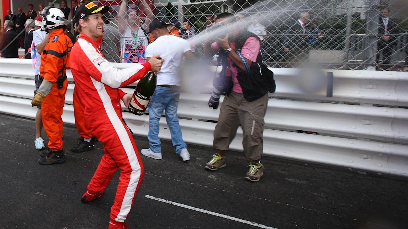 Sebastian Vettel (GER) Ferrari  celebrates in parc ferme with the champagne at Formula One World Championship, Rd6, Monaco Grand Prix Race, Monte-Carlo, Monaco, Sunday 24 May 2015. © Sutton Motorsport Images