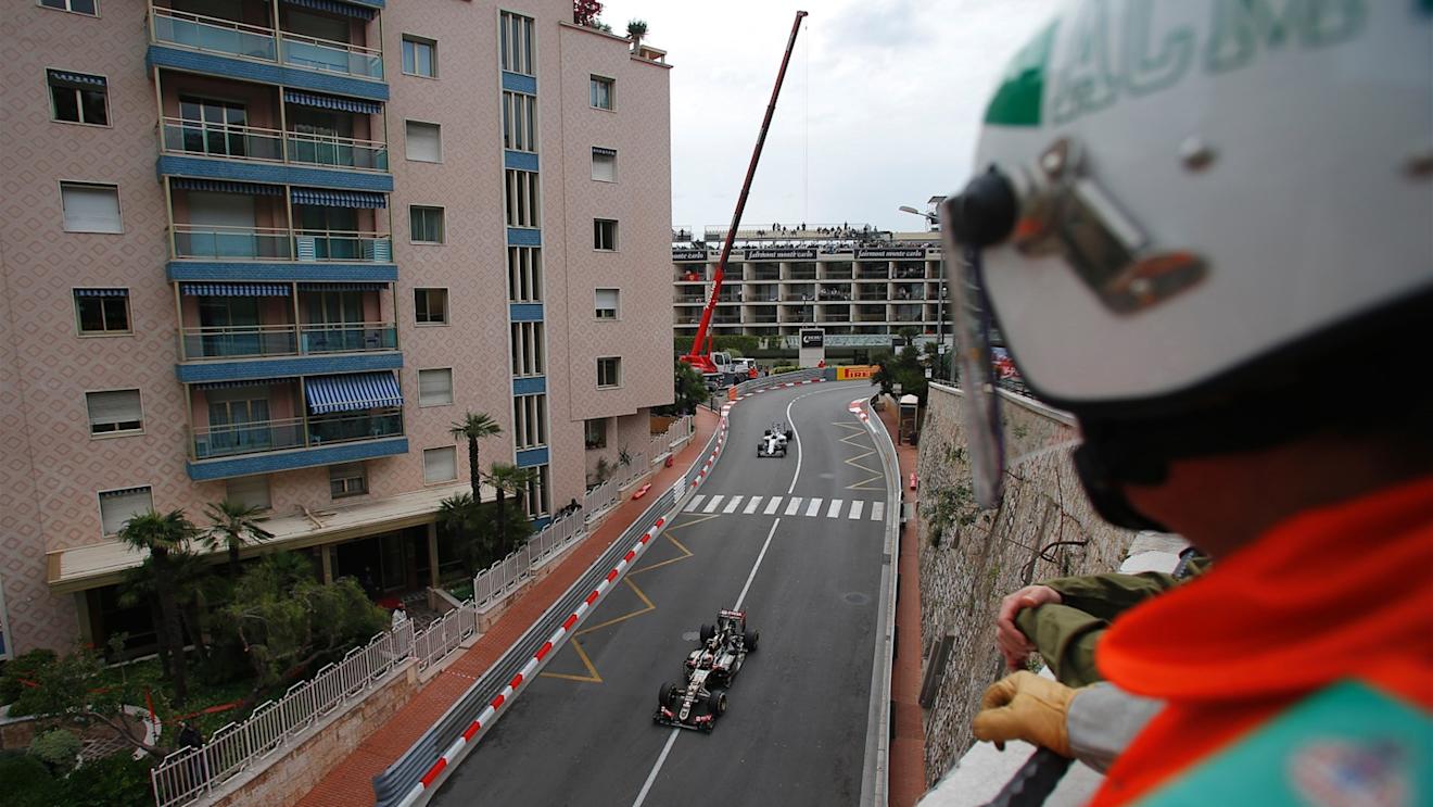 Marshal watches Romain Grosjean (FRA) Lotus E23 Hybrid at Formula One World Championship, Rd6, Monaco Grand Prix Practice, Monte-Carlo, Monaco, Thursday 21  May 2015. © Sutton Motorsport Images