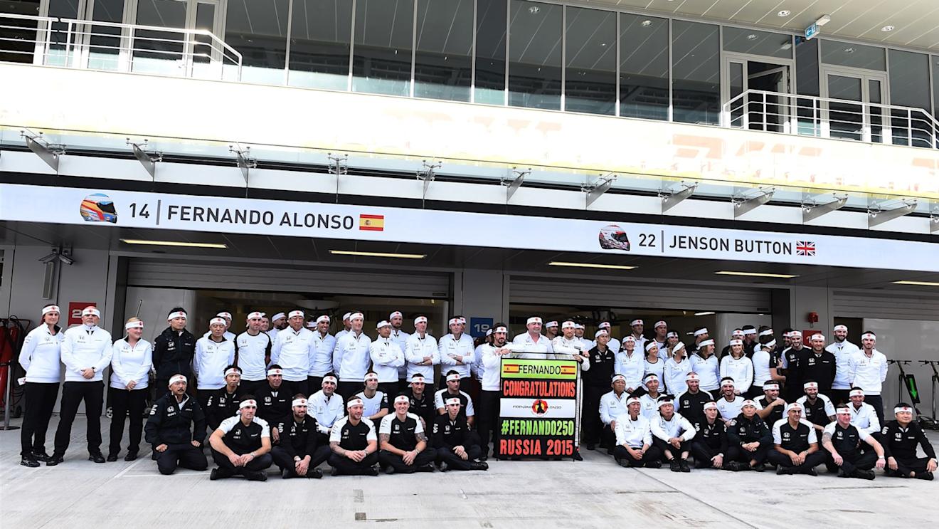 Fernando Alonso (ESP) McLaren celebrates 250 Grands Prix with Eric Boullier (FRA) McLaren Racing Director, Jenson Button (GBR) McLaren and the team at Formula One World Championship, Rd15, Russian Grand Prix, Practice, Sochi Autodrom, Sochi, Krasnodar Krai, Russia, Friday 9 October 2015. © Sutton Motorsport Images