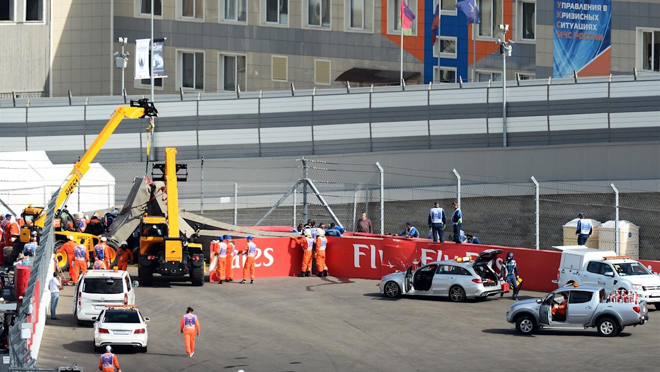 Medical crew attend to Carlos Sainz (ESP) Scuderia Toro Rosso STR10 following his crash in FP3 at Formula One World Championship, Rd15, Russian Grand Prix, Qualifying, Sochi Autodrom, Sochi, Krasnodar Krai, Russia, Saturday 10 October 2015. © Sutton Motorsport Images