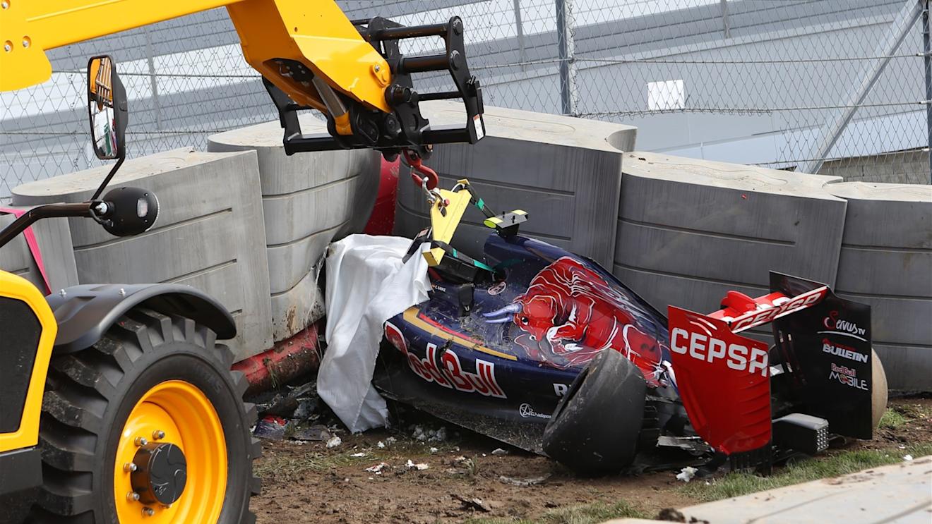 The crashed car of Carlos Sainz (ESP) Scuderia Toro Rosso is recovered from under the tech pro barrier in FP3 at Formula One World Championship, Rd15, Russian Grand Prix, Qualifying, Sochi Autodrom, Sochi, Krasnodar Krai, Russia, Saturday 10 October 2015. © Sutton Motorsport Images