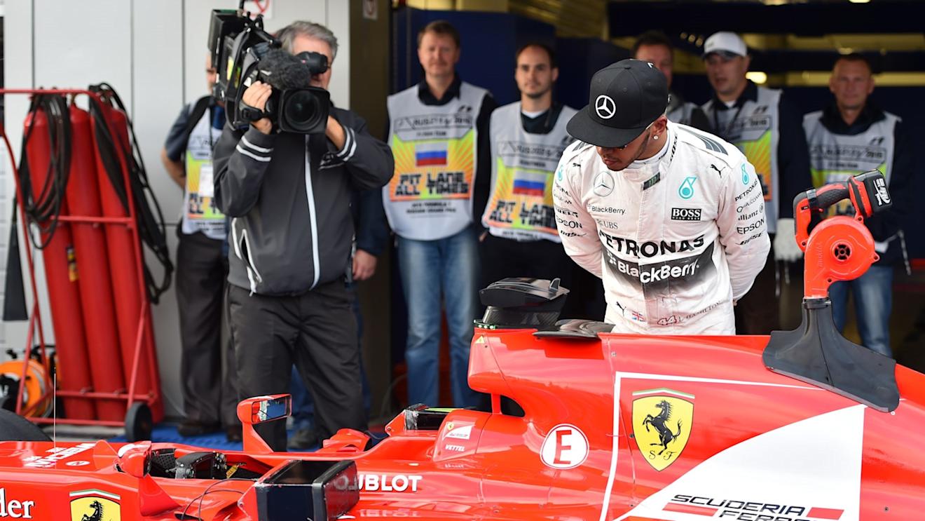Lewis Hamilton (GBR) Mercedes AMG F1 W06 looks at the car of Sebastian Vettel (GER) Ferrari SF15-T in parc ferme at Formula One World Championship, Rd15, Russian Grand Prix, Qualifying, Sochi Autodrom, Sochi, Krasnodar Krai, Russia, Saturday 10 October 2015. © Sutton Motorsport Images