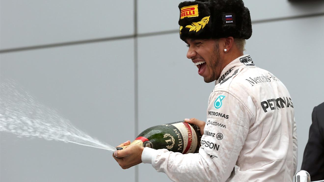 Race winner Lewis Hamilton (GBR) Mercedes AMG F1 celebrates on the podium with champagne at Formula One World Championship, Rd15, Russian Grand Prix, Race, Sochi Autodrom, Sochi, Krasnodar Krai, Russia, Sunday 11 October 2015. © Sutton Motorsport Images