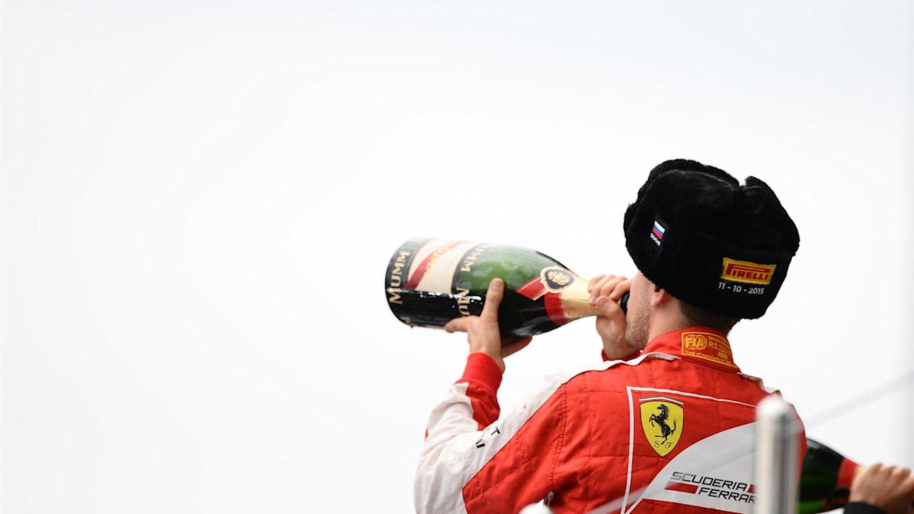 Sebastian Vettel (GER) Ferrari celebrates on the podium with champagne at Formula One World Championship, Rd15, Russian Grand Prix, Race, Sochi Autodrom, Sochi, Krasnodar Krai, Russia, Sunday 11 October 2015. © Sutton Motorsport Images