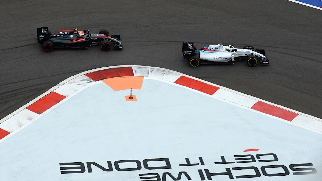 Jenson Button (GBR) McLaren MP4-30 and Felipe Massa (BRA) Williams FW37 at Formula One World Championship, Rd15, Russian Grand Prix, Race, Sochi Autodrom, Sochi, Krasnodar Krai, Russia, Sunday 11 October 2015. © Sutton Motorsport Images