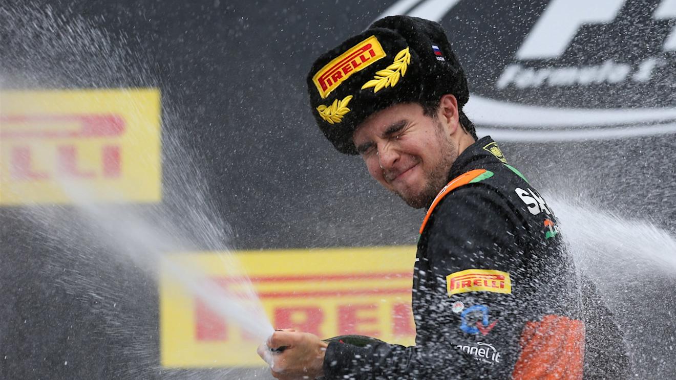 Sergio Perez (MEX) Force India celebrates with champagne on the podium at Formula One World Championship, Rd15, Russian Grand Prix, Race, Sochi Autodrom, Sochi, Krasnodar Krai, Russia, Sunday 11 October 2015. © Sutton Motorsport Images