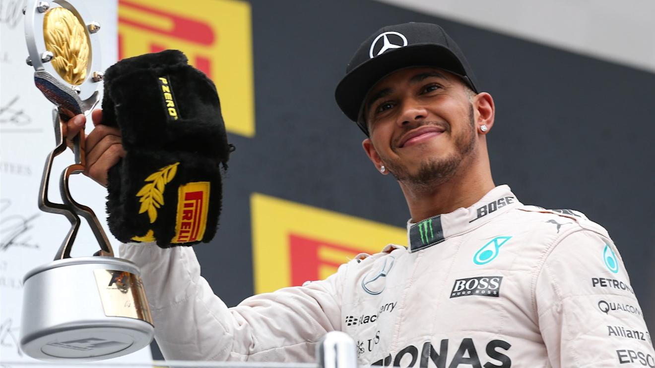 Race winner Lewis Hamilton (GBR) Mercedes AMG F1 celebrates with the trophy on the podium at Formula One World Championship, Rd15, Russian Grand Prix, Race, Sochi Autodrom, Sochi, Krasnodar Krai, Russia, Sunday 11 October 2015. © Sutton Motorsport Images