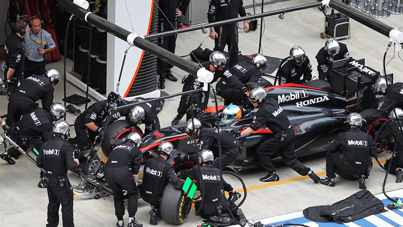 Pit stop for Fernando Alonso (ESP) McLaren MP4-30 at Formula One World Championship, Rd15, Russian Grand Prix, Race, Sochi Autodrom, Sochi, Krasnodar Krai, Russia, Sunday 11 October 2015. © Sutton Motorsport Images