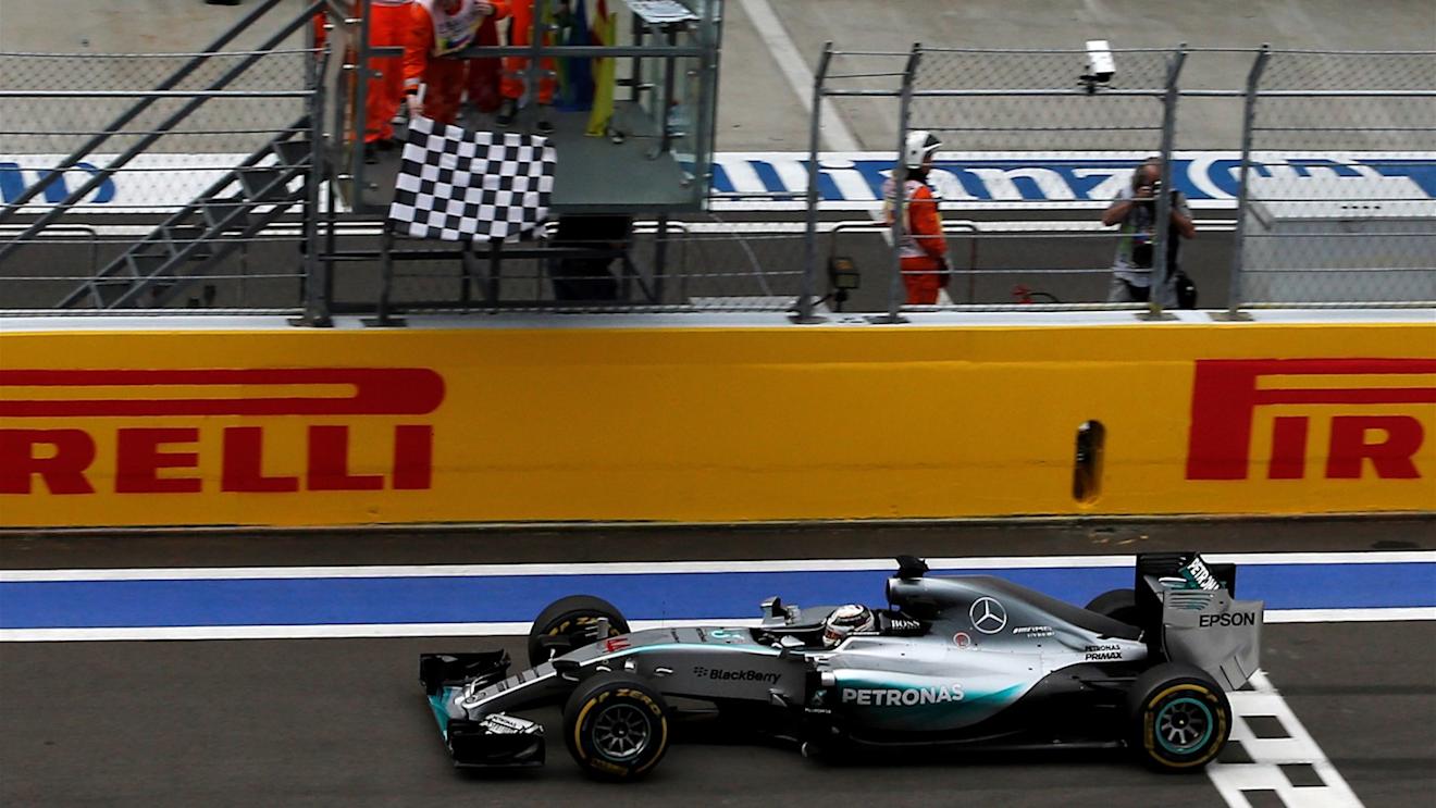 Race winner Lewis Hamilton (GBR) Mercedes AMG F1 W06 crosses the line and takes the chequered flag at Formula One World Championship, Rd15, Russian Grand Prix, Race, Sochi Autodrom, Sochi, Krasnodar Krai, Russia, Sunday 11 October 2015. © Sutton Motorsport Images