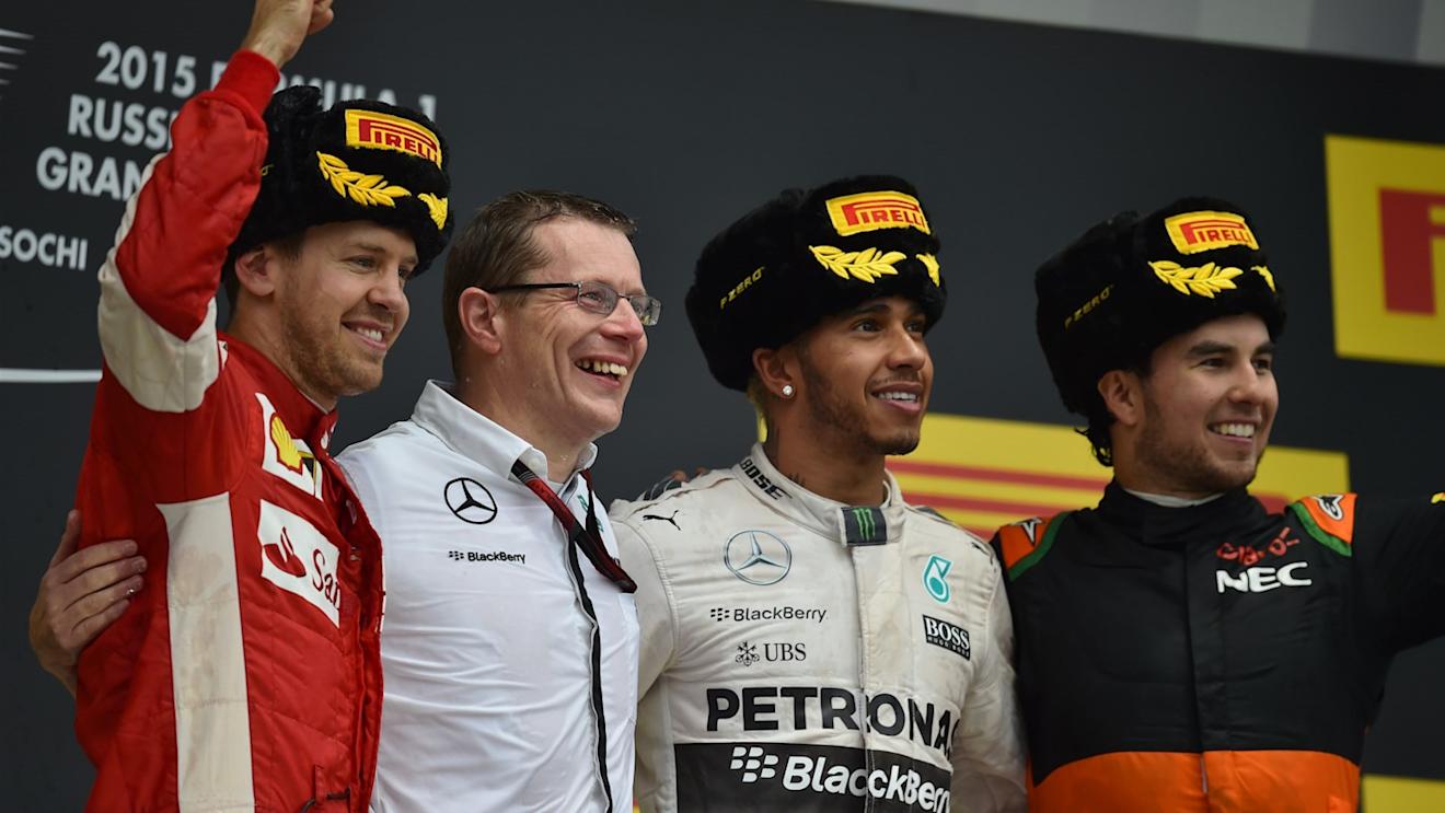 (L to R): Sebastian Vettel (GER) Ferrari, Andy Cowell (GBR) Managing Director, race winner Lewis Hamilton (GBR) Mercedes AMG F1 and Sergio Perez (MEX) Force India celebrate on the podium at Formula One World Championship, Rd15, Russian Grand Prix, Race, Sochi Autodrom, Sochi, Krasnodar Krai, Russia, Sunday 11 October 2015. © Sutton Motorsport Images
