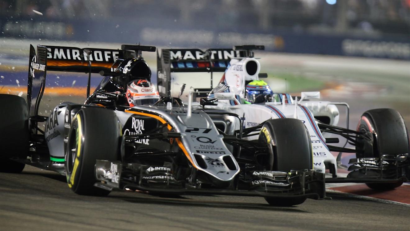 Nico Hulkenberg (GER) Force India VJM08 and Felipe Massa (BRA) Williams FW37 crash at Formula One World Championship, Rd13, Singapore Grand Prix, Race, Marina Bay Street Circuit, Singapore, Sunday 20 September 2015. © Sutton Motorsport Images