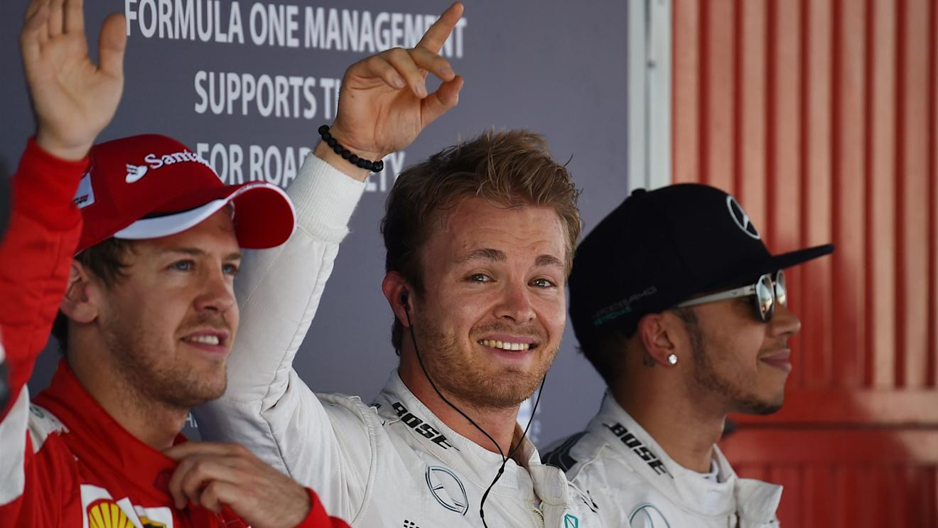lre Sebastian Vettel (GER) Ferrari, pole sitter Nico Rosberg (GER) Mercedes AMG F1 and Lewis Hamilton (GBR) Mercedes AMG F1 celebrate in parc ferme at Formula One World Championship, Rd5, Spanish Grand Prix Qualifying, Barcelona, Spain, Saturday 9 May 2015. © Sutton Motorsport Images