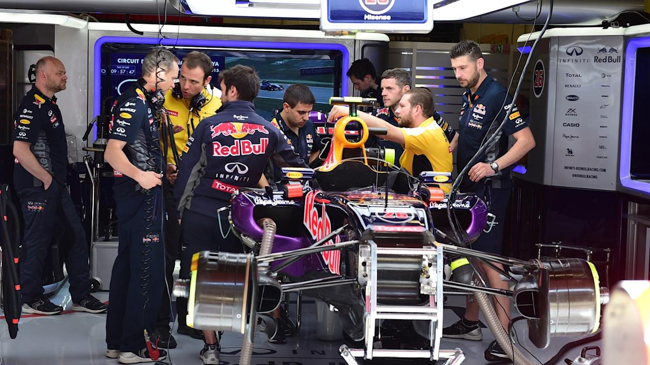 The car of Daniil Kvyat (RUS) Red Bull Racing RB11 is worked on in the garage at Formula One World Championship, Rd5, Spanish Grand Prix Qualifying, Barcelona, Spain, Saturday 9 May 2015. © Sutton Motorsport Images