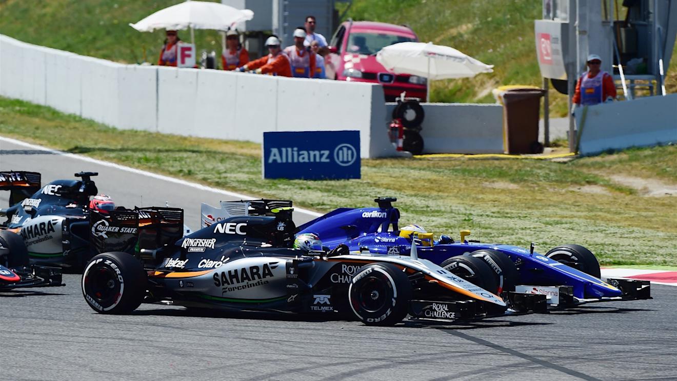 Sergio Perez (MEX) Force India VJM08 and Marcus Ericsson (SWE) Sauber C34 battle at the start of the race at Formula One World Championship, Rd5, Spanish Grand Prix Qualifying, Barcelona, Spain, Saturday 9 May 2015. © Sutton Motorsport Images