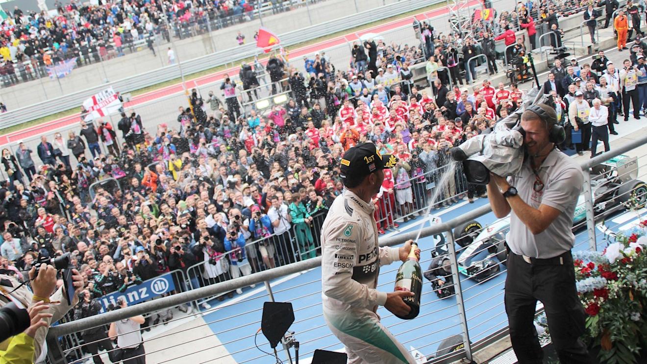 Lewis Hamilton (GBR) Mercedes AMG F1 celebrates on the podium with the cahmpagne at Formula One World Championship, Rd16, United States  Grand Prix, Race, Austin, Texas, USA, Sunday 25 October 2015. © Sutton Motorsport Images