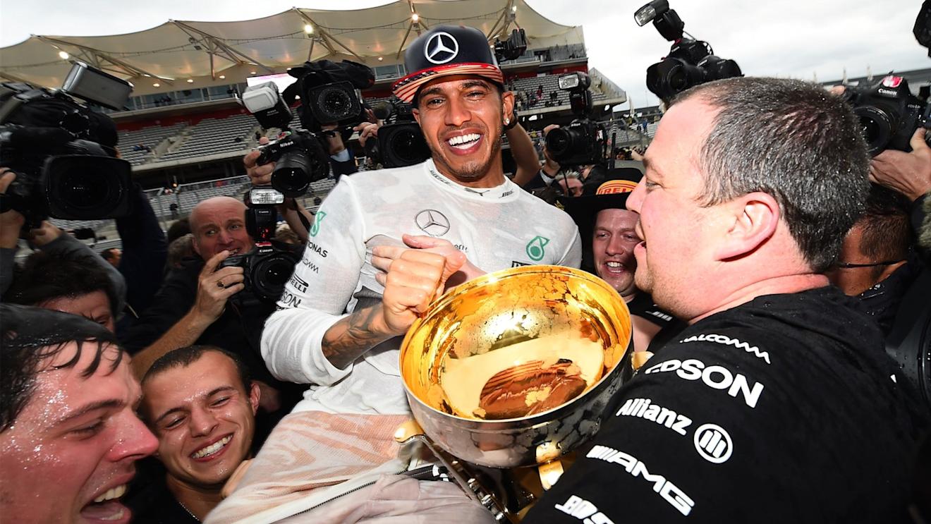 Race winner and new World Champion Lewis Hamilton (GBR) Mercedes AMG F1 celebrates with the team at Formula One World Championship, Rd16, United States  Grand Prix, Race, Austin, Texas, USA, Sunday 25 October 2015. © Sutton Motorsport Images