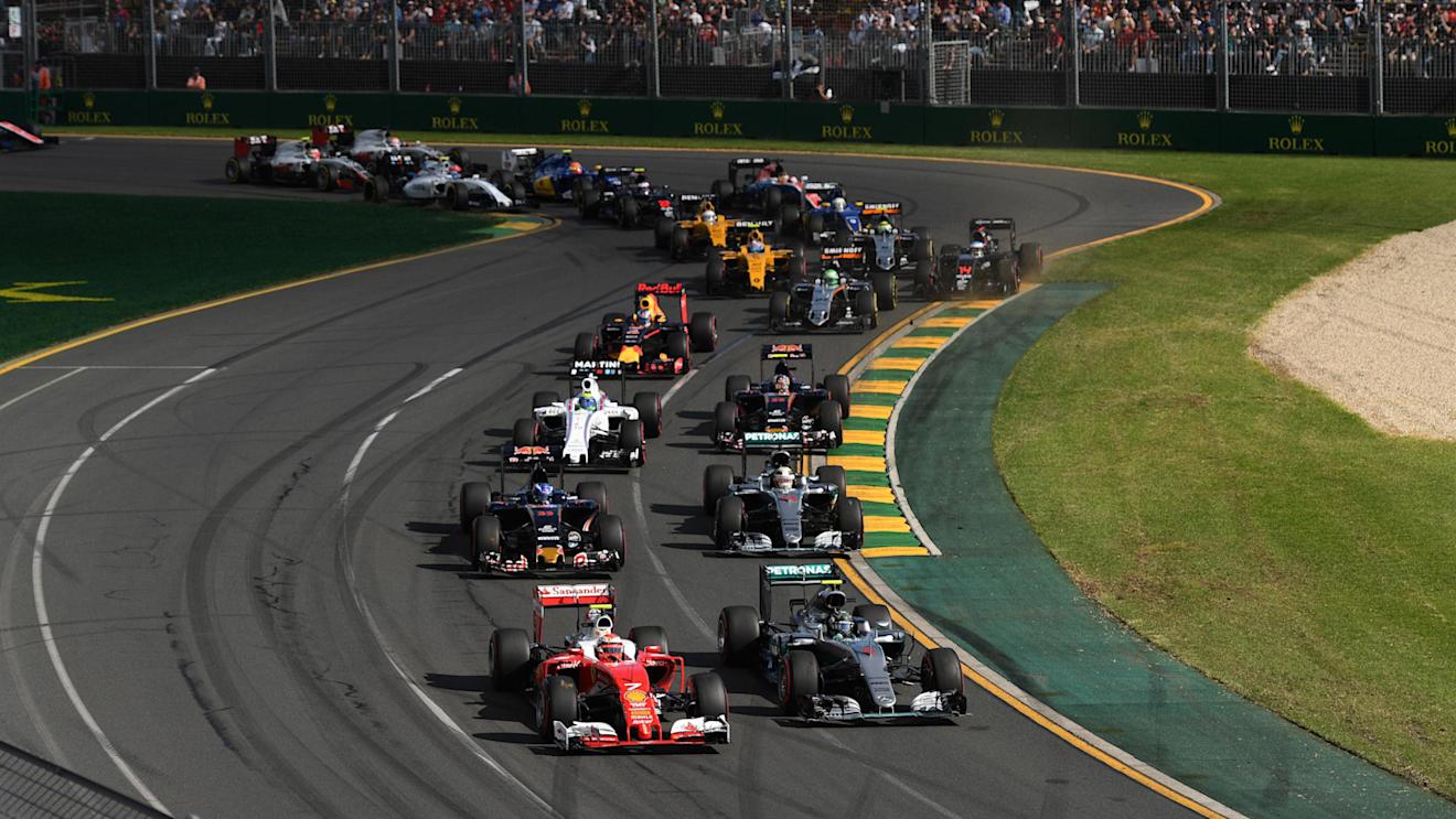 Kimi Raikkonen (FIN) Ferrari SF16-H and Nico Rosberg (GER) Mercedes-Benz F1 W07 Hybrid battle at the start of the race at Formula One World Championship, Rd1, Australian Grand Prix, Race, Albert Park, Melbourne, Australia, Sunday 20 March 2016. © Sutton Motorsport Images