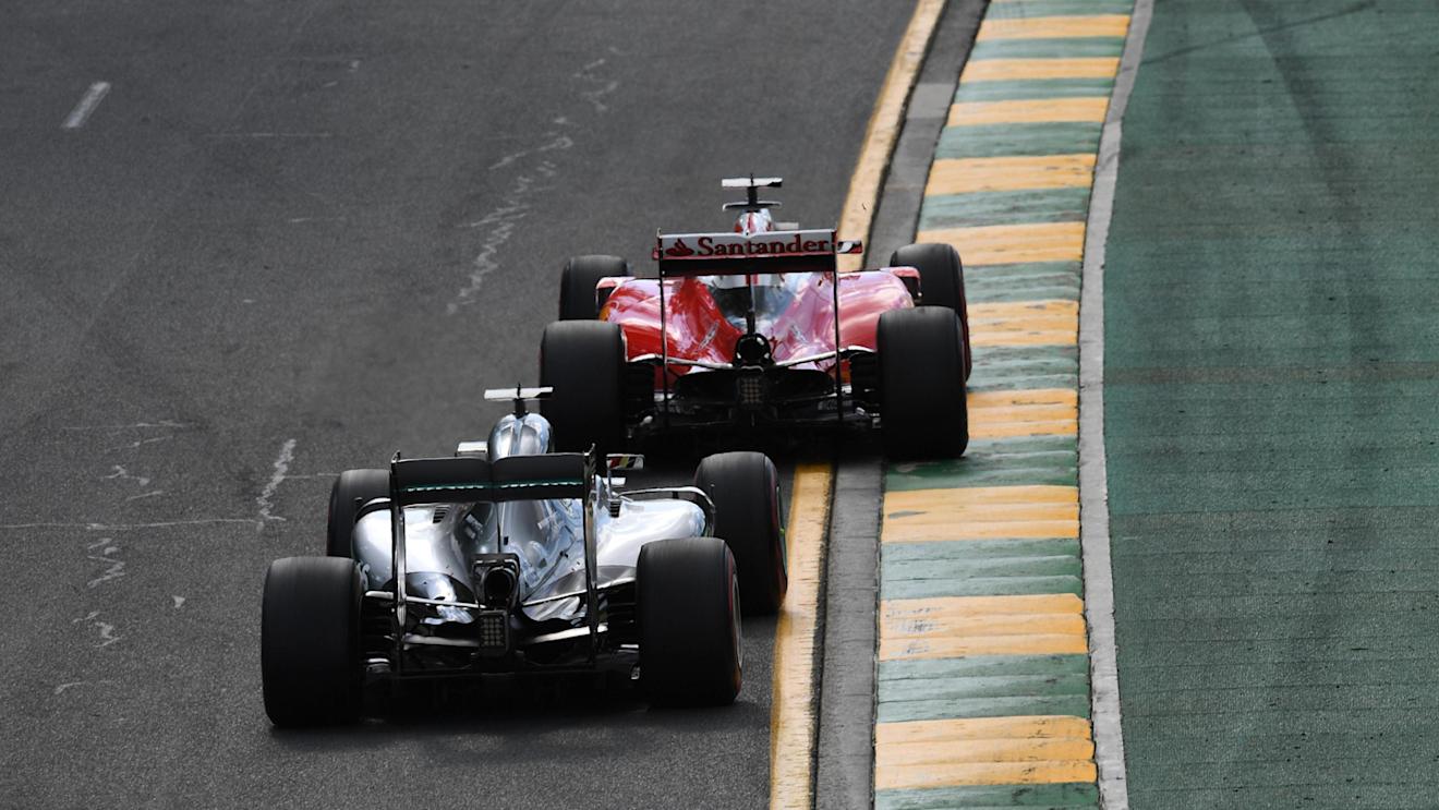 Sebastian Vettel (GER) Ferrari SF16-H and Lewis Hamilton (GBR) Mercedes-Benz F1 W07 Hybrid battle at Formula One World Championship, Rd1, Australian Grand Prix, Race, Albert Park, Melbourne, Australia, Sunday 20 March 2016. © Sutton Motorsport Images