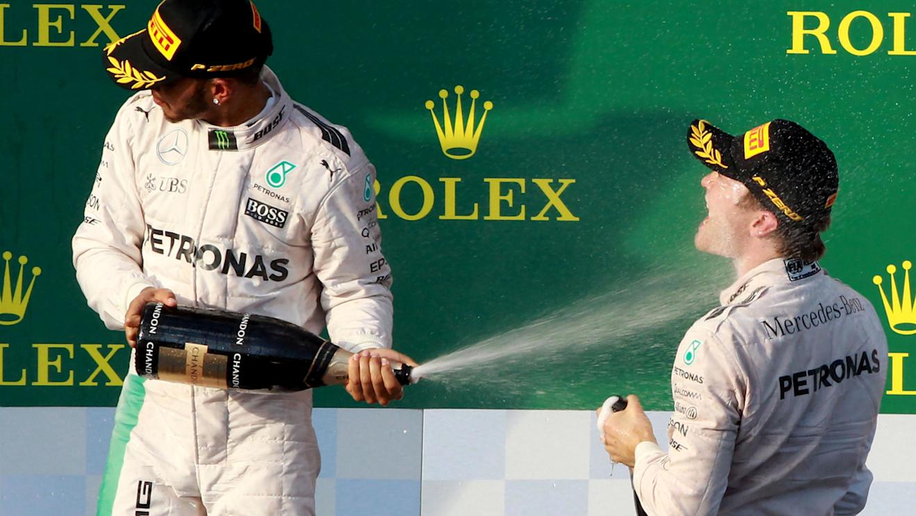 Lewis Hamilton (GBR) Mercedes AMG F1 and Nico Rosberg (GER) Mercedes AMG F1 celebrate on the podium with the champagne at Formula One World Championship, Rd1, Australian Grand Prix, Race, Albert Park, Melbourne, Australia, Sunday 20 March 2016. © Sutton Motorsport Images