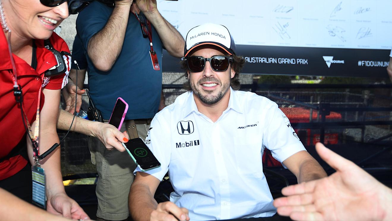 Fernando Alonso (ESP) McLaren signs autographs for the fans at Formula One World Championship, Rd1, Australian Grand Prix, Preparations, Albert Park, Melbourne, Australia, Thursday 17 March 2016. © 2014