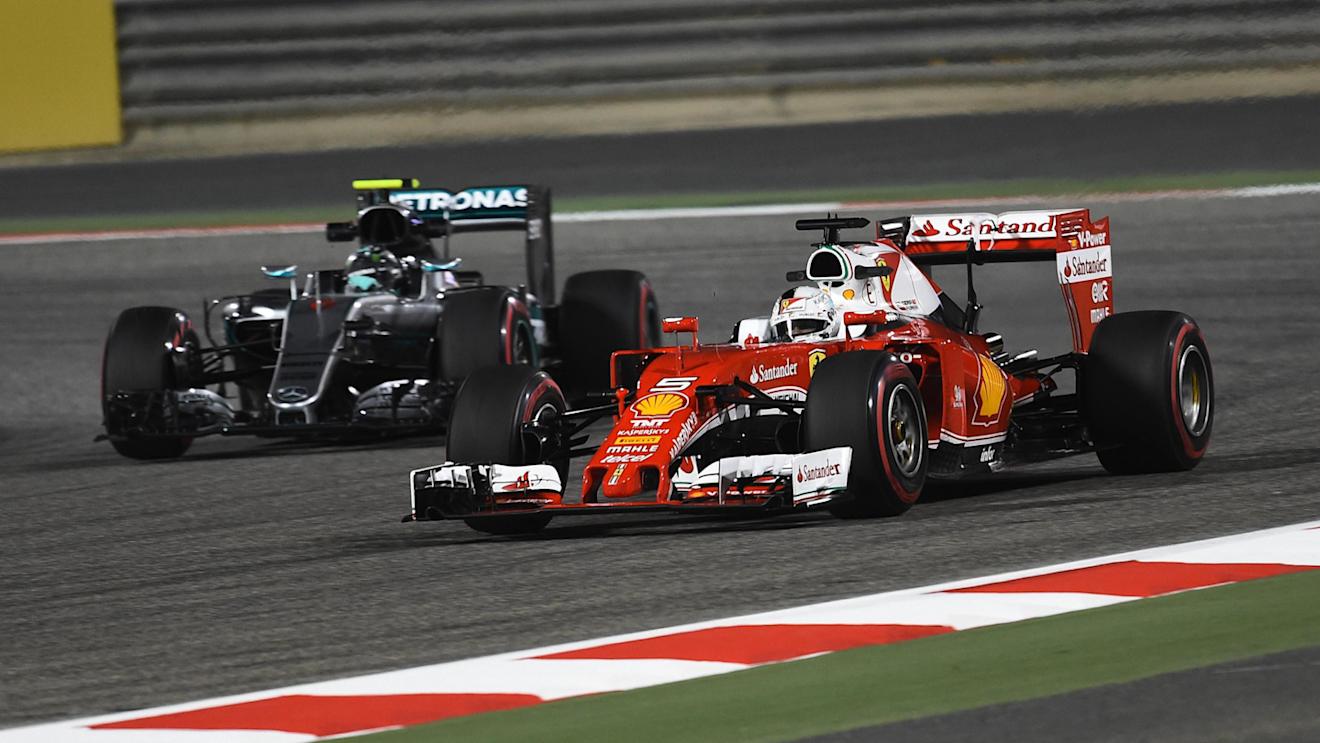 Sebastian Vettel (GER) Ferrari SF16-H and Nico Rosberg (GER) Mercedes-Benz F1 W07 Hybrid at Formula One World Championship, Rd2, Bahrain Grand Prix Practice, Bahrain International Circuit, Sakhir, Bahrain, Friday 1 April 2016. © Sutton Motorsport Images