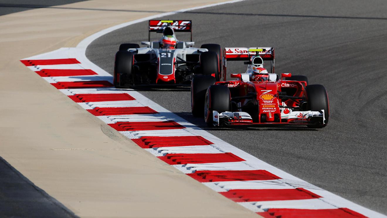 Kimi Raikkonen (FIN) Ferrari SF16-H and Esteban Gutierrez (MEX) Haas VF-16 at Formula One World Championship, Rd2, Bahrain Grand Prix Qualifying, Bahrain International Circuit, Sakhir, Bahrain, Saturday 2 April 2016. © Sutton Motorsport Images