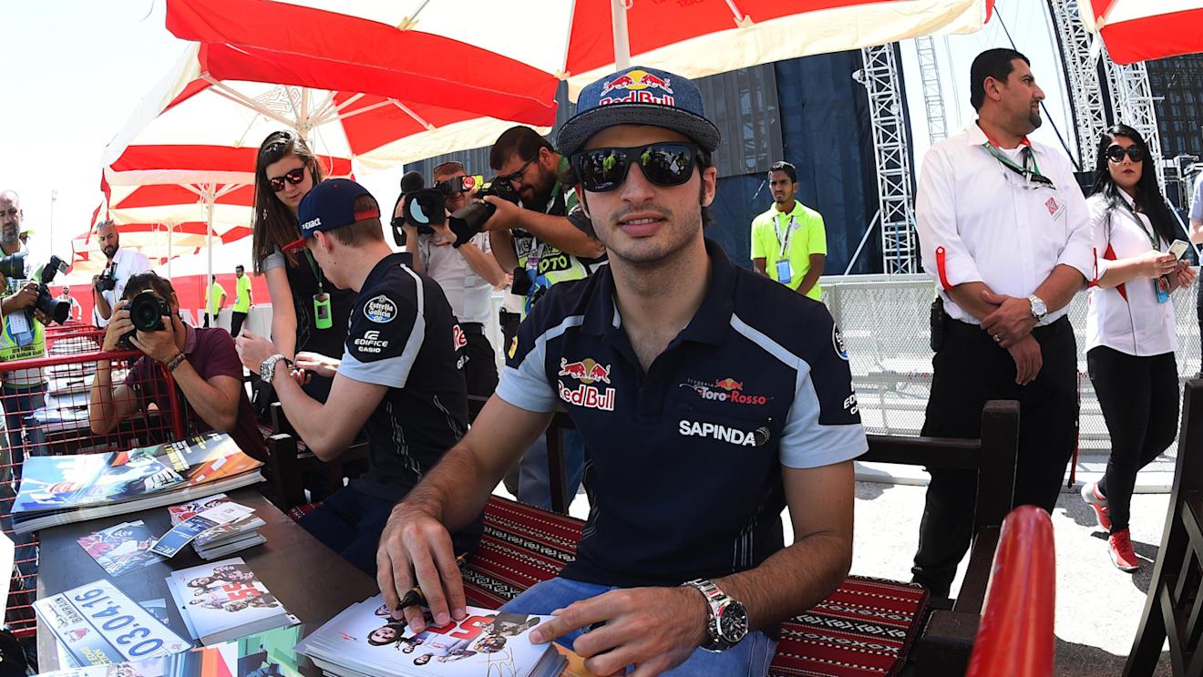 Carlos Sainz (ESP) Scuderia Toro Rosso at the autograph session at Formula One World Championship, Rd2, Bahrain Grand Prix Qualifying, Bahrain International Circuit, Sakhir, Bahrain, Saturday 2 April 2016. © Sutton Motorsport Images