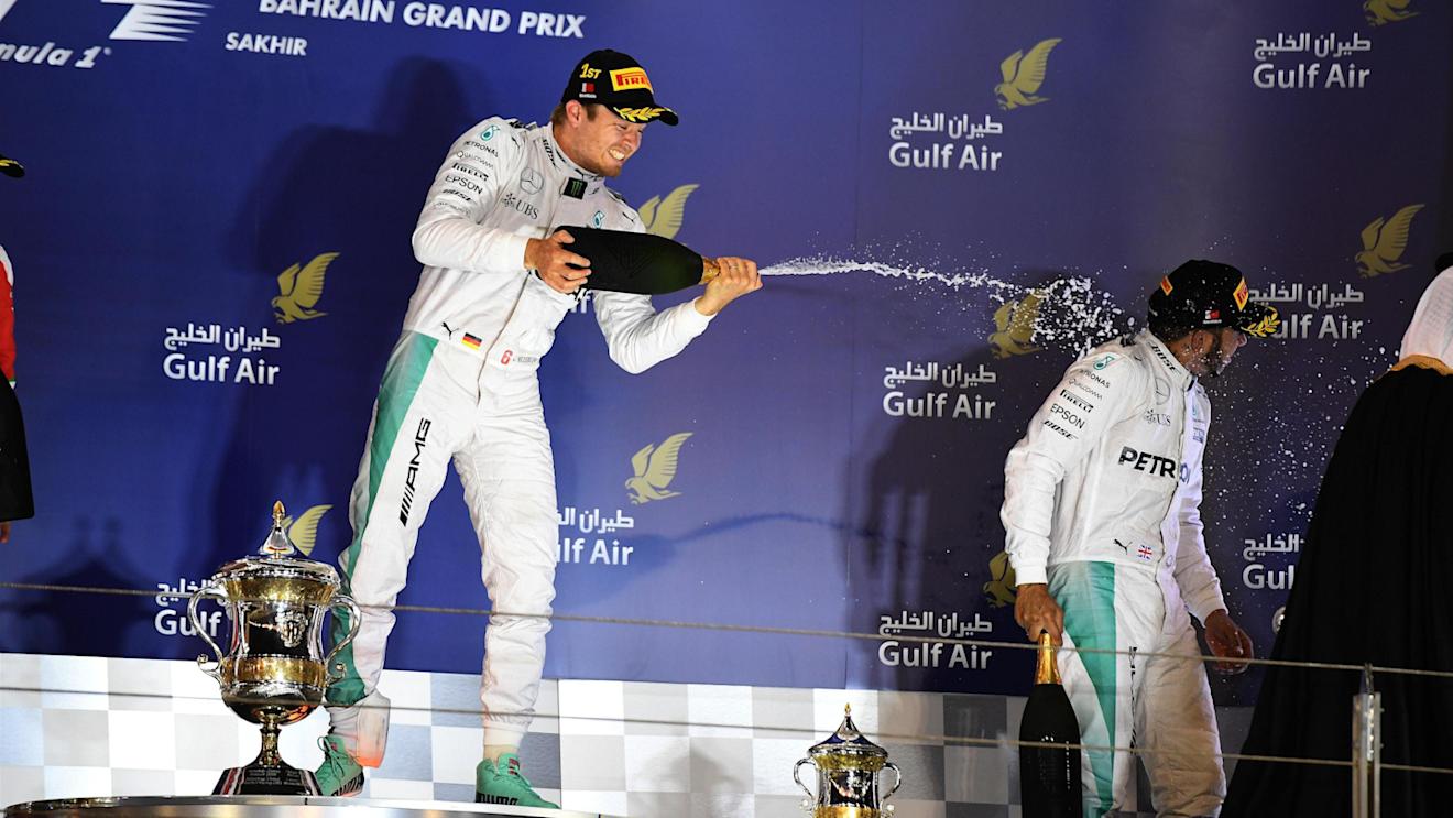 Race winner Nico Rosberg (GER) Mercedes AMG F1 and Lewis Hamilton (GBR) Mercedes AMG F1 celebrate on the podium at Formula One World Championship, Rd2, Bahrain Grand Prix Race, Bahrain International Circuit, Sakhir, Bahrain, Sunday 3 April 2016. © Sutton Motorsport Images