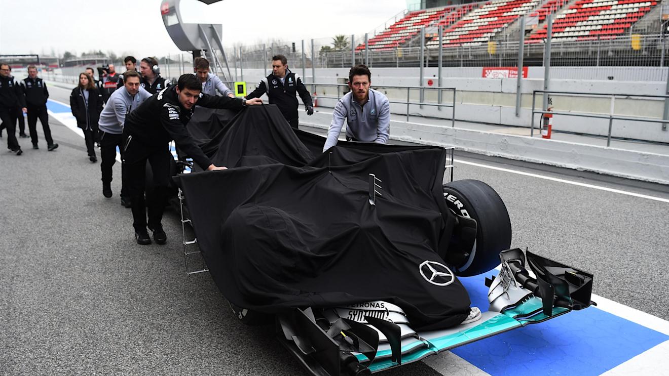 Mercedes AMG F1 mechanics with Mercedes-Benz F1 W07 Hybrid in pit lane at Formula One Testing, Day Two, Barcelona, Spain, Wednesday 2 March 2016. © Sutton Motorsport Images