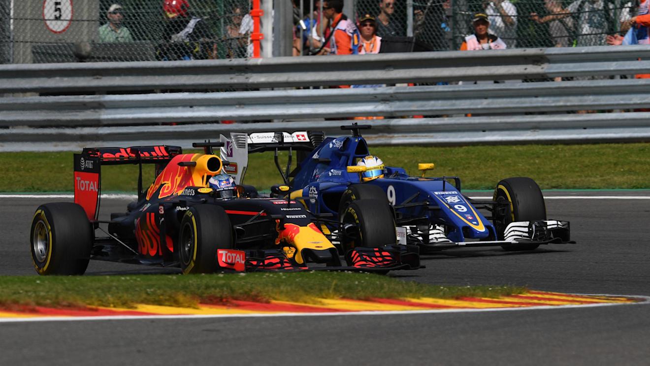 Daniel Ricciardo (AUS) Red Bull Racing RB12 and Marcus Ericsson (SWE) Sauber C35 at Formula One World Championship, Rd13, Belgian Grand Prix, Practice, Spa Francorchamps, Belgium, Friday 26 August 2016. © Sutton Images