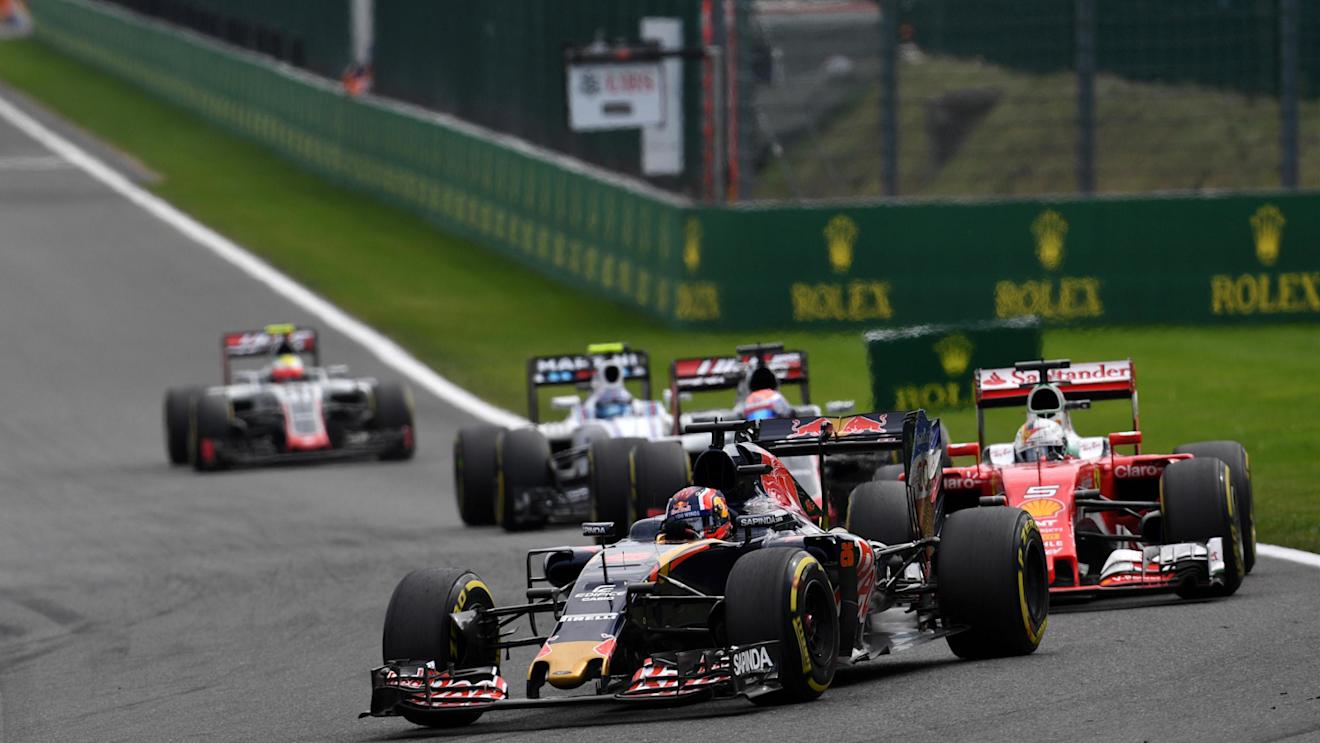 Daniil Kvyat (RUS) Scuderia Toro Rosso STR11 leads Sebastian Vettel (GER) Ferrari SF16-H at Formula One World Championship, Rd13, Belgian Grand Prix, Race, Spa Francorchamps, Belgium, Sunday 28 August 2016. © Sutton Images