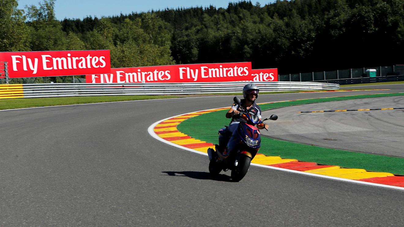 Carlos Sainz (ESP) Scuderia Toro Rosso rides the track on a scooter at Formula One World Championship, Rd13, Belgian Grand Prix, Preparations, Spa Francorchamps, Belgium, Thursday 25 August 2016. © Sutton Images