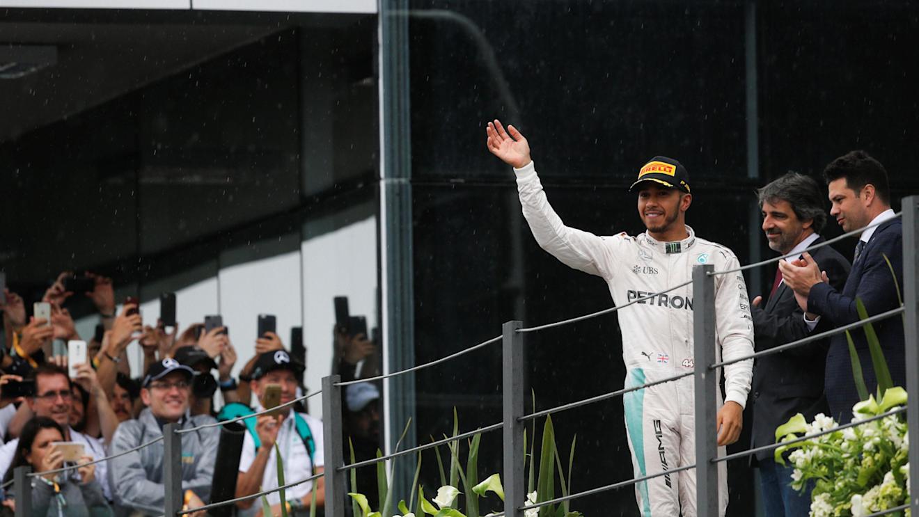 Lewis Hamilton (GBR) Mercedes AMG F1 celebrates on the podium at Formula One World Championship, Rd20, Brazilian Grand Prix, Race, Interlagos, Sao Paulo, Brazil, Sunday 13 November 2016. © Sutton Images