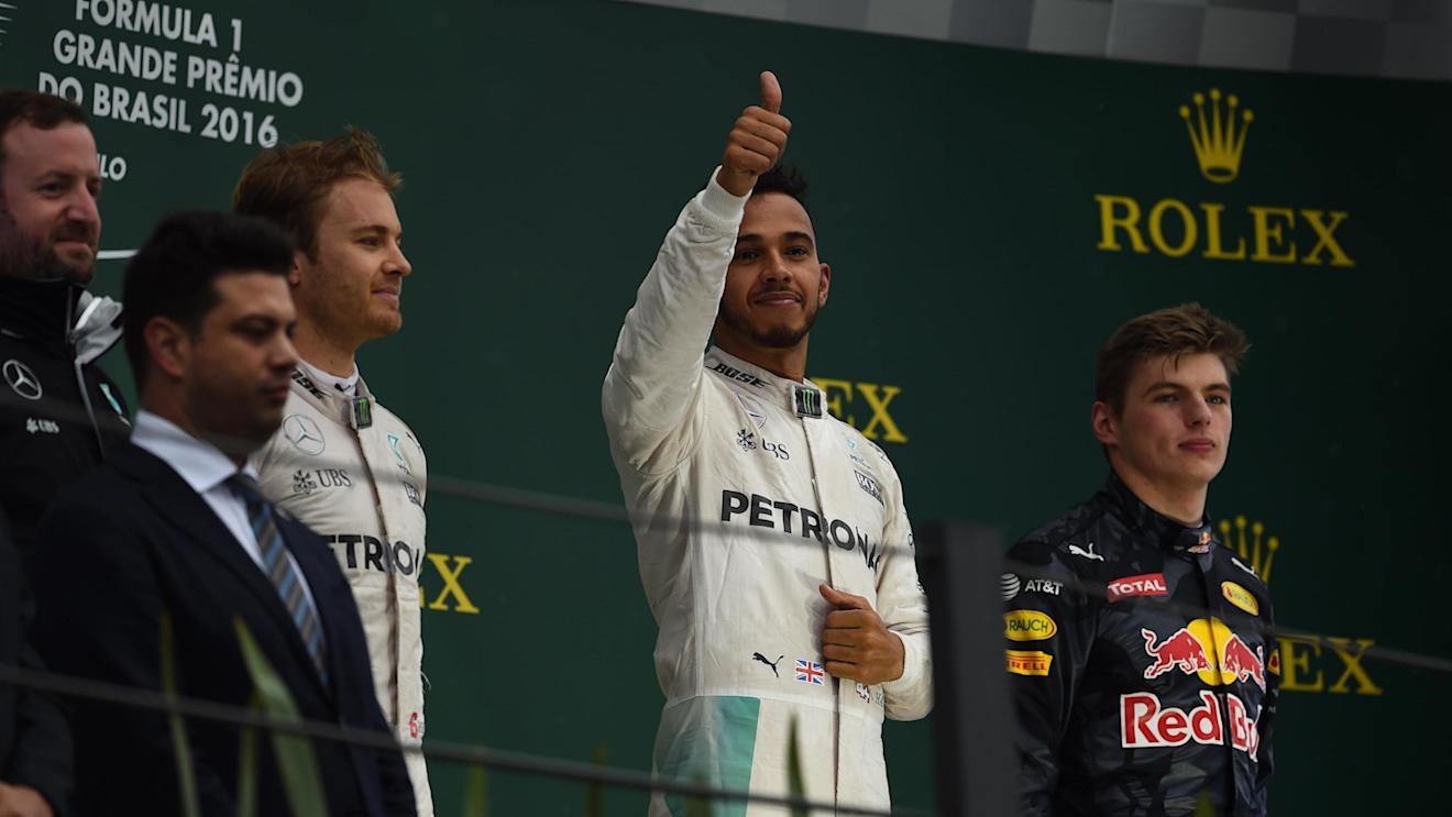 Nico Rosberg (GER) Mercedes AMG F1, Bradley Lord (GBR) Mercedes AMG F1 Communication Manager, Lewis Hamilton (GBR) Mercedes AMG F1 and Max Verstappen (NED) Red Bull Racing celebrate on the podium at Formula One World Championship, Rd20, Brazilian Grand Prix, Race, Interlagos, Sao Paulo, Brazil, Sunday 13 November 2016. © Sutton Images