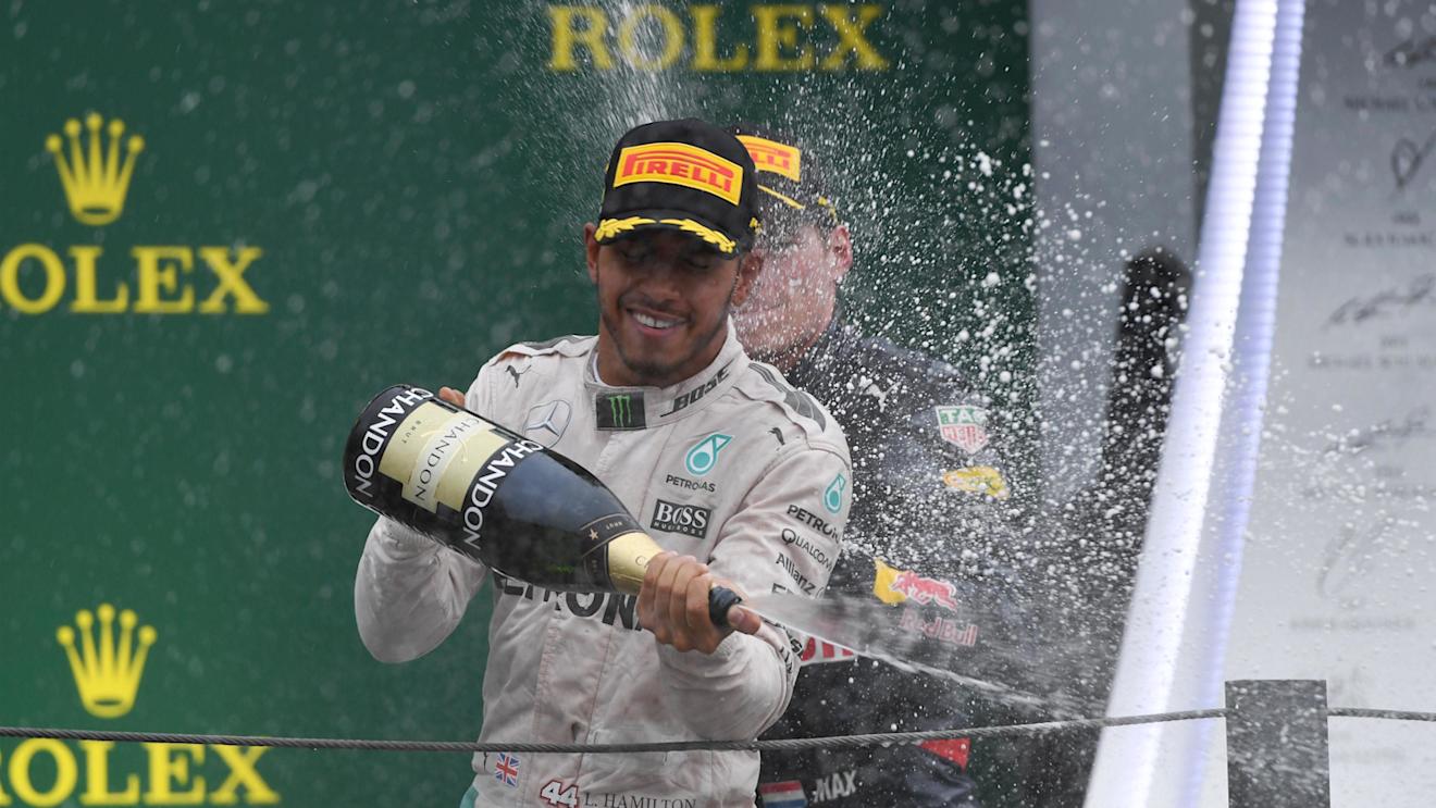 Lewis Hamilton (GBR) Mercedes AMG F1 and Max Verstappen (NED) Red Bull Racing celebrate on the podium with the champagne at Formula One World Championship, Rd20, Brazilian Grand Prix, Race, Interlagos, Sao Paulo, Brazil, Sunday 13 November 2016. © Sutton Images