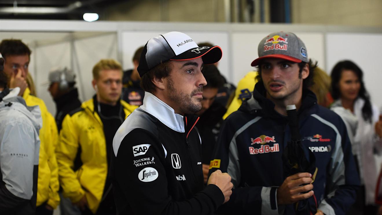 Fernando Alonso (ESP) McLaren and Carlos Sainz (ESP) Scuderia Toro Rosso on the drivers parade at Formula One World Championship, Rd20, Brazilian Grand Prix, Race, Interlagos, Sao Paulo, Brazil, Sunday 13 November 2016. © Sutton Images