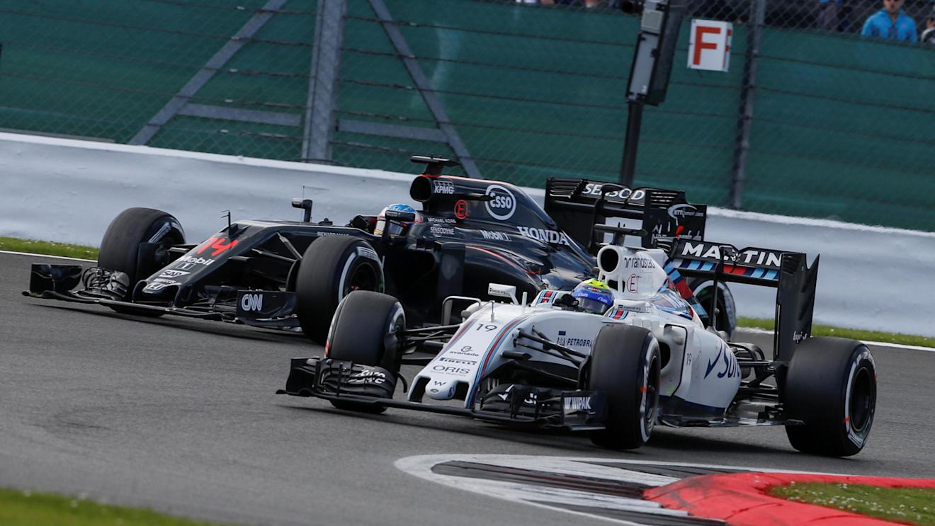 Fernando Alonso (ESP) McLaren MP4-31 and Valtteri Bottas (FIN) Williams FW38 battle for position at Formula One World Championship, Rd10, British Grand Prix, Race, Silverstone, England, Sunday 10 July 2016. © Sutton Images