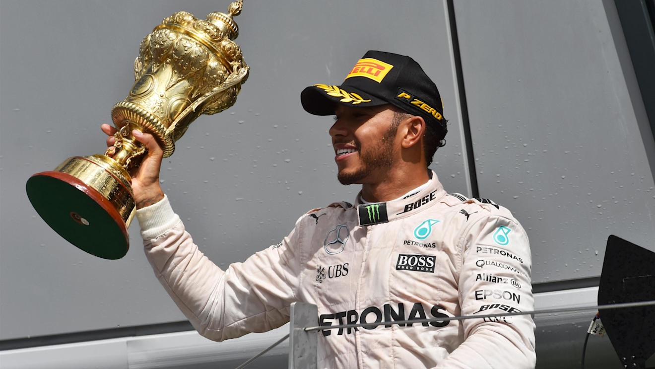 Race winner Lewis Hamilton (GBR) Mercedes AMG F1 celebrates with the trophy at Formula One World Championship, Rd10, British Grand Prix, Race, Silverstone, England, Sunday 10 July 2016. © Sutton Images