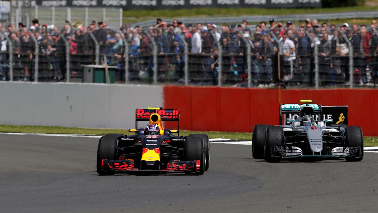 Max Verstappen (NED) Red Bull Racing RB12 AND Nico Rosberg (GER) Mercedes-Benz F1 W07 Hybrid BATTLE at Formula One World Championship, Rd10, British Grand Prix, Race, Silverstone, England, Sunday 10 July 2016. © Sutton Images
