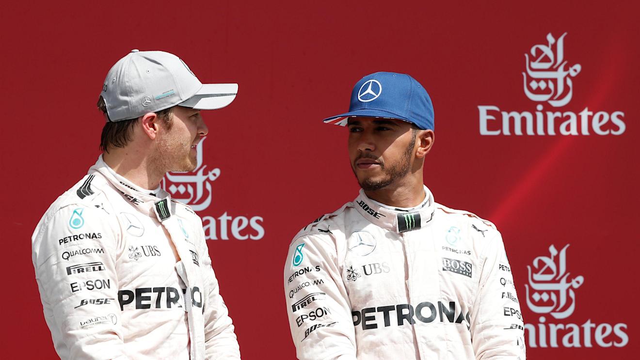 Race winner Lewis Hamilton (GBR) Mercedes AMG F1 and Nico Rosberg (GER) Mercedes AMG F1 on the podium at Formula One World Championship, Rd10, British Grand Prix, Race, Silverstone, England, Sunday 10 July 2016. © Sutton Images