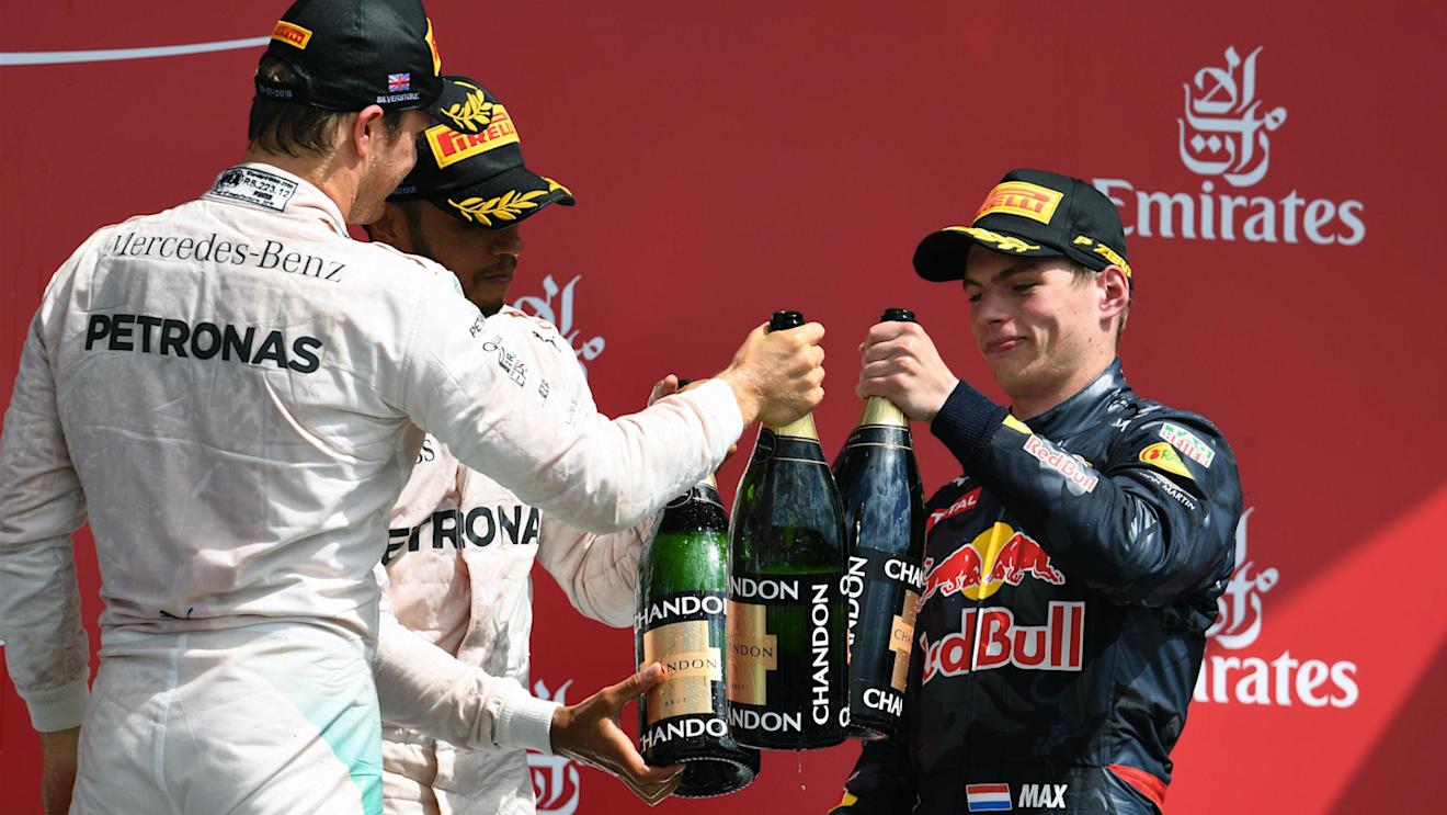 Race winner Lewis Hamilton (GBR) Mercedes AMG F1, Nico Rosberg (GER) Mercedes AMG F1 and Max Verstappen (NED) Red Bull Racing celebrate on the podium with the champagne at Formula One World Championship, Rd10, British Grand Prix, Race, Silverstone, England, Sunday 10 July 2016. © Sutton Images