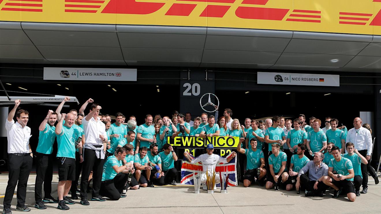 Race winner Lewis Hamilton (GBR) Mercedes AMG F1 celebrates with the team at Formula One World Championship, Rd10, British Grand Prix, Race, Silverstone, England, Sunday 10 July 2016. © Sutton Images