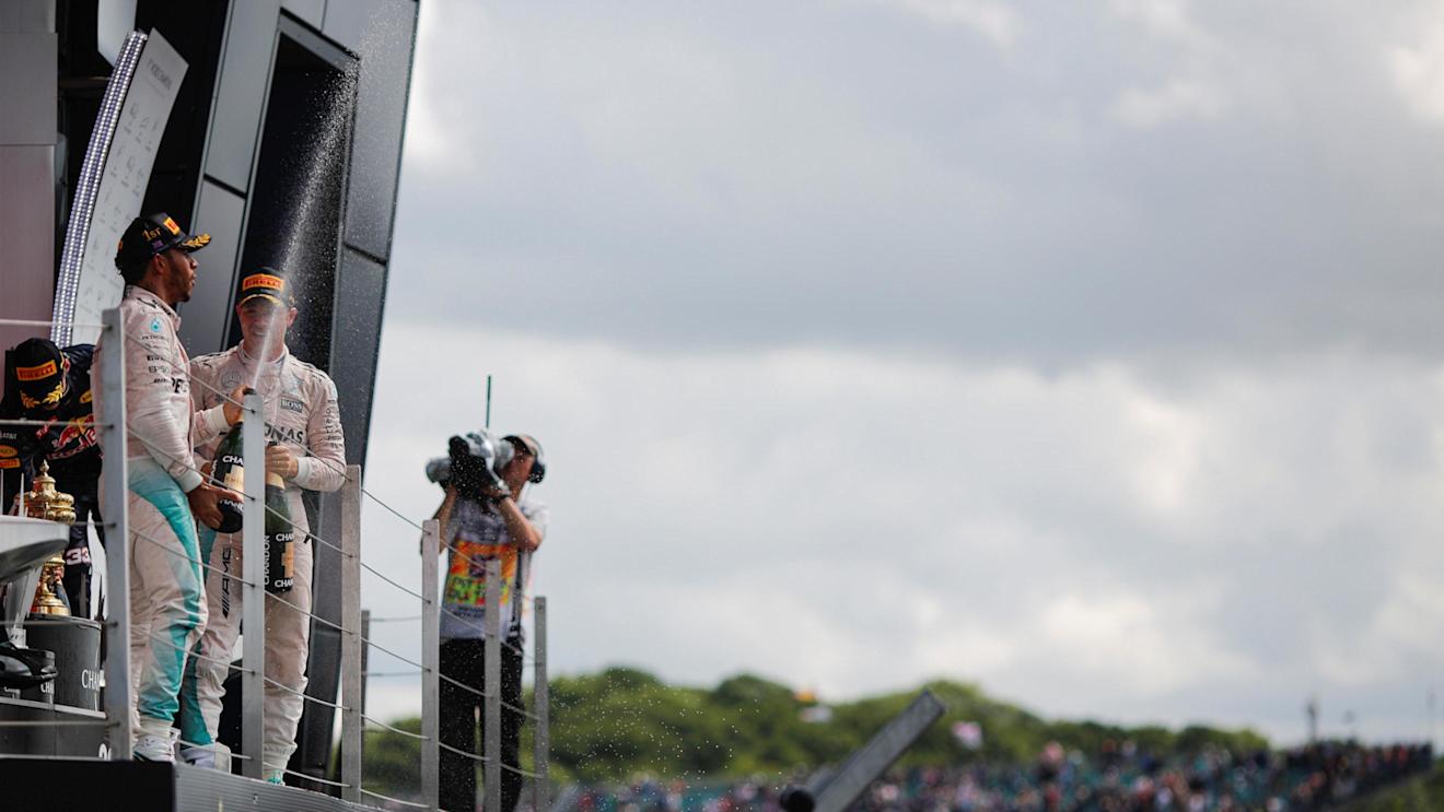 Lewis Hamilton (GBR) Mercedes AMG F1 celebrates on the podium with the champagne at Formula One World Championship, Rd10, British Grand Prix, Race, Silverstone, England, Sunday 10 July 2016. © Sutton Images