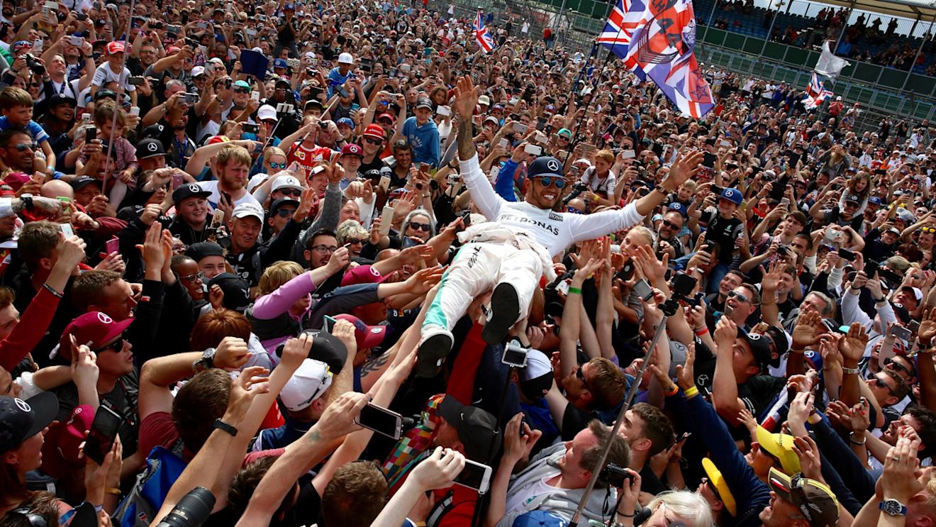 Race winner Lewis Hamilton (GBR) Mercedes AMG F1 celebrates with the fans at Formula One World Championship, Rd10, British Grand Prix, Race, Silverstone, England, Sunday 10 July 2016. © Sutton Images