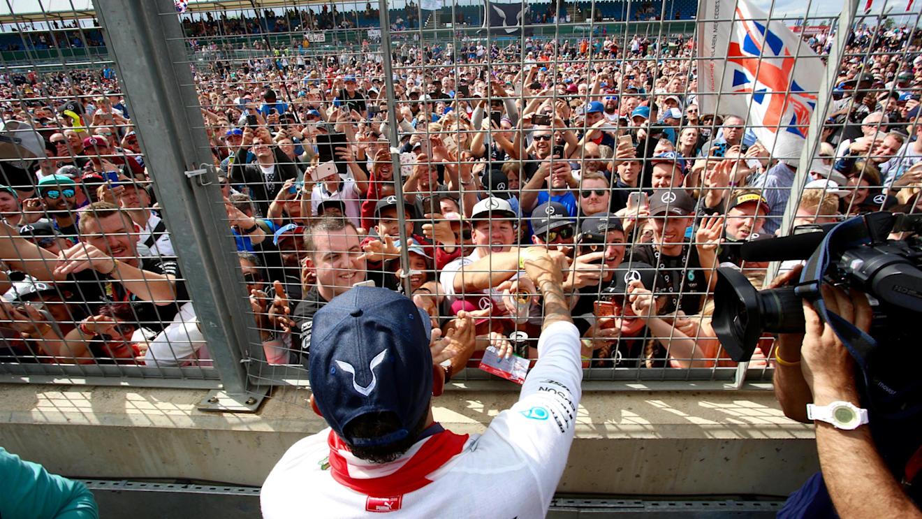 Race winner Lewis Hamilton (GBR) Mercedes AMG F1 celebrates with the fans at Formula One World Championship, Rd10, British Grand Prix, Race, Silverstone, England, Sunday 10 July 2016. © Sutton Images