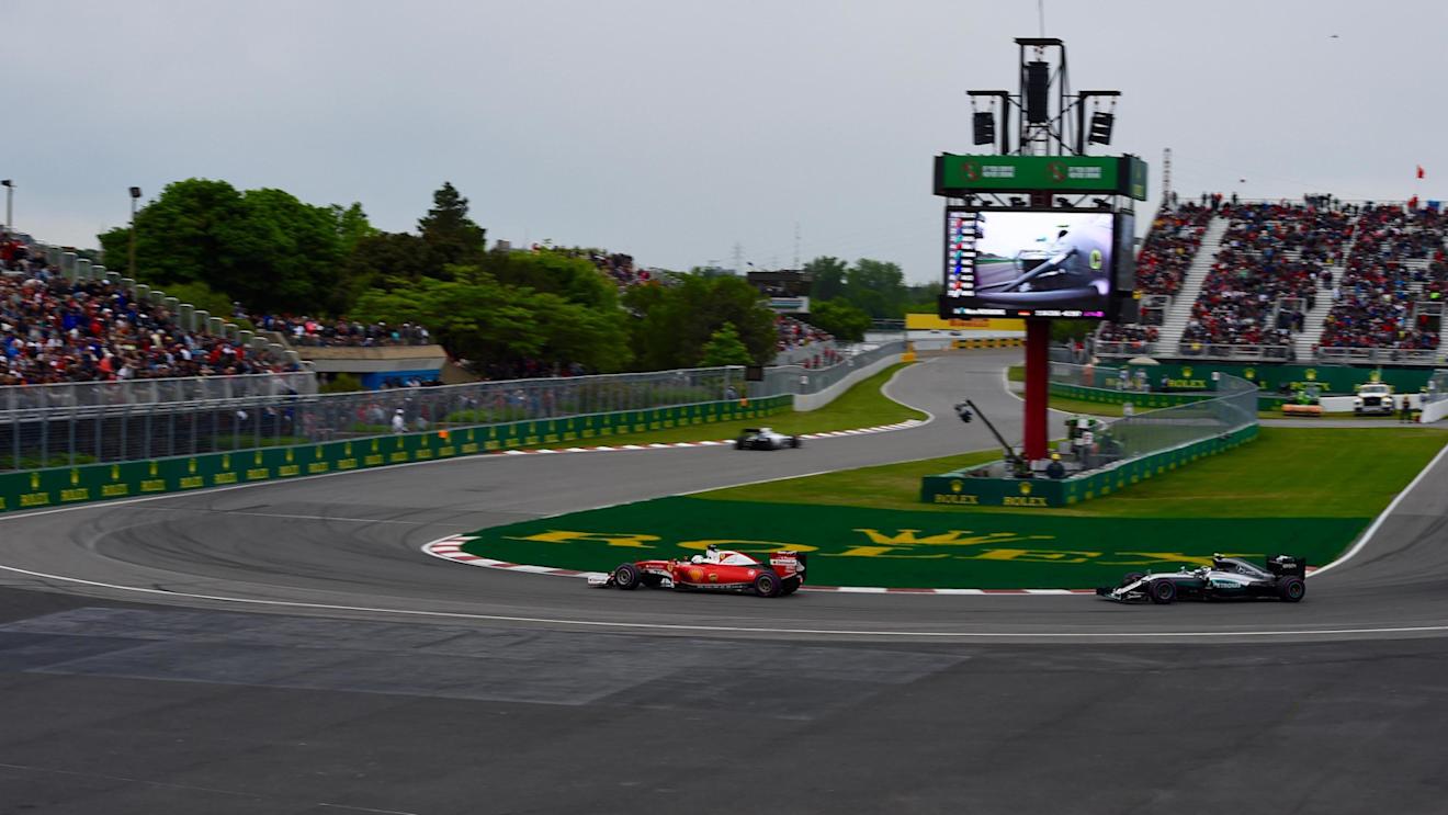 Sebastian Vettel (GER) Ferrari SF16-H and Nico Rosberg (GER) Mercedes-Benz F1 W07 Hybrid at Formula One World Championship, Rd7, Canadian Grand Prix, Qualifying, Montreal, Canada, Saturday 11 June 2016. © Sutton Images