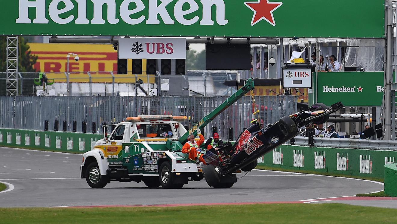 The crashed car of Carlos Sainz jr (ESP) Scuderia Toro Rosso STR11 is recovered at Formula One World Championship, Rd7, Canadian Grand Prix, Qualifying, Montreal, Canada, Saturday 11 June 2016. © Sutton Images