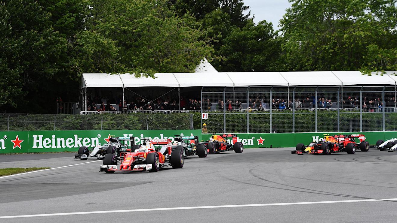 Sebastian Vettel (GER) Ferrari SF16-H leads at the start of the race at Formula One World Championship, Rd7, Canadian Grand Prix, Race, Montreal, Canada, Sunday 12 June 2016. © Sutton Images
